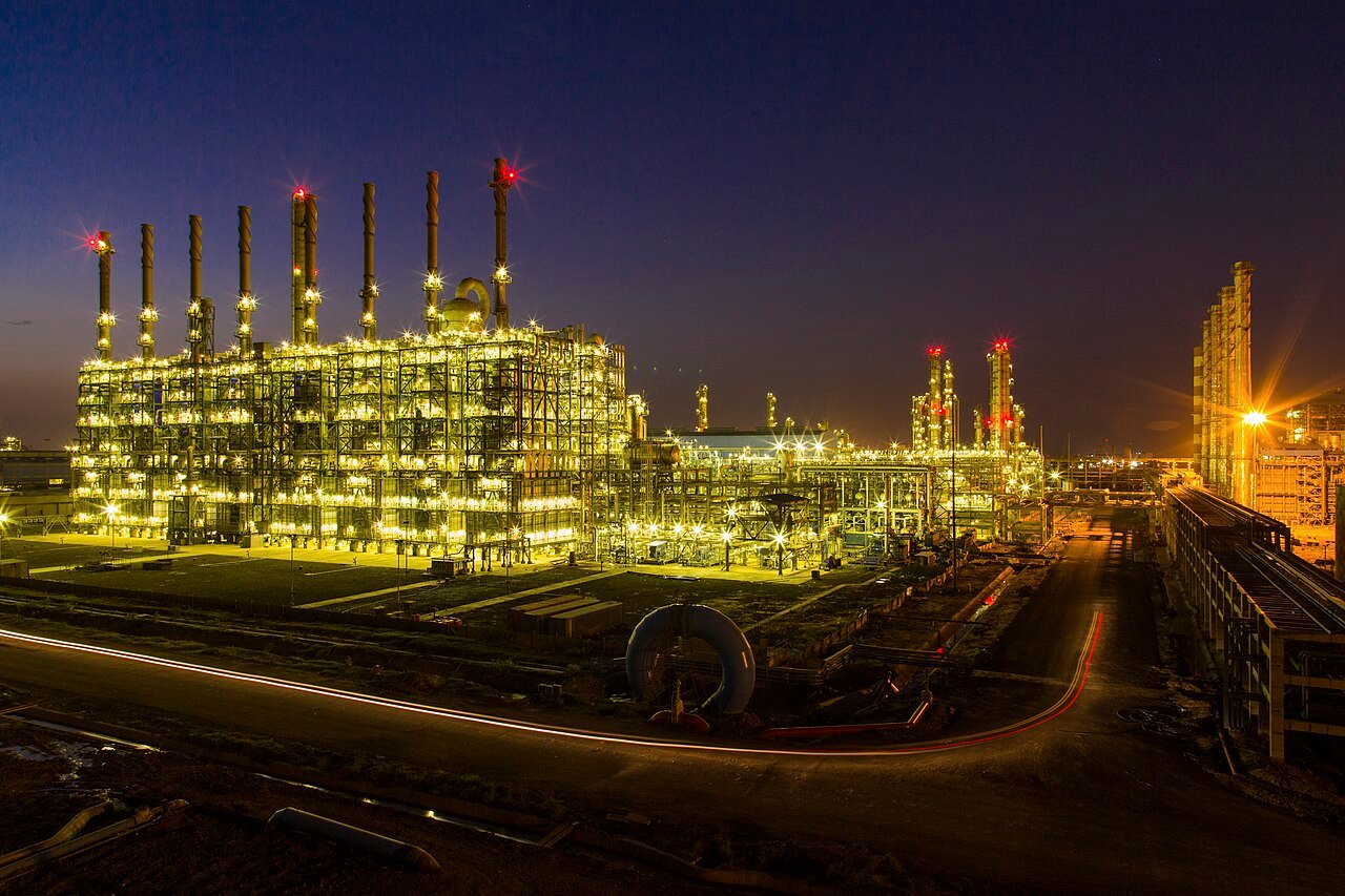 hero photo — gas plant / compressor station at dusk